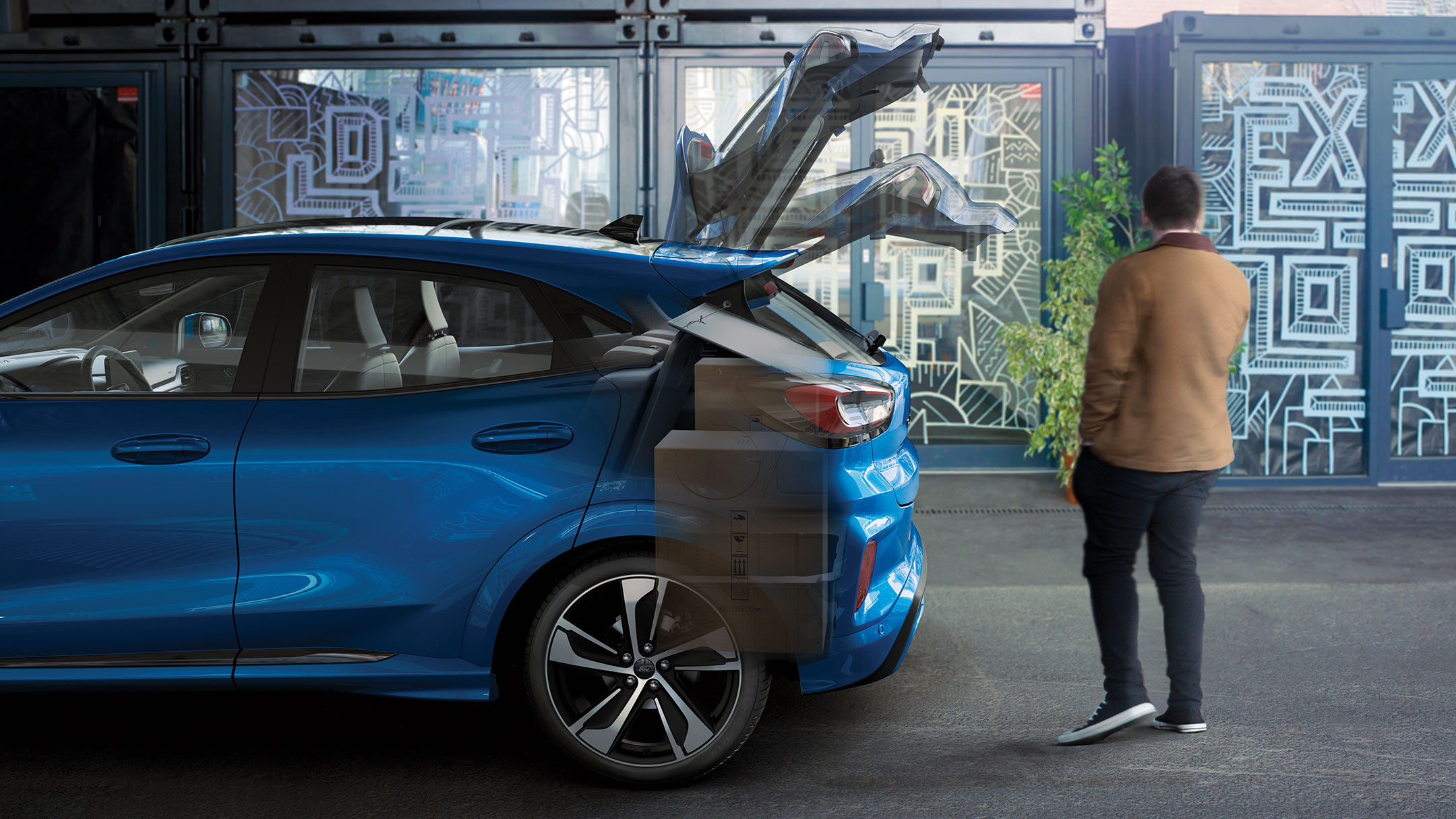 Ford Puma in Blau. Seitenansicht mit visualisiertem Stauraum und MegaBox