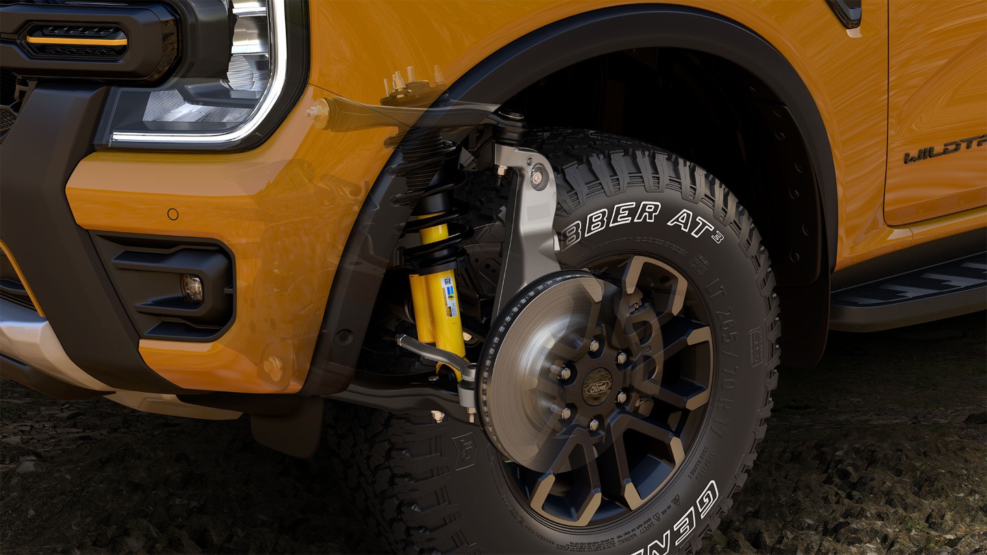 Ford Ranger Wildtrak X in Orange. Detailansicht der Federung und Bremse.