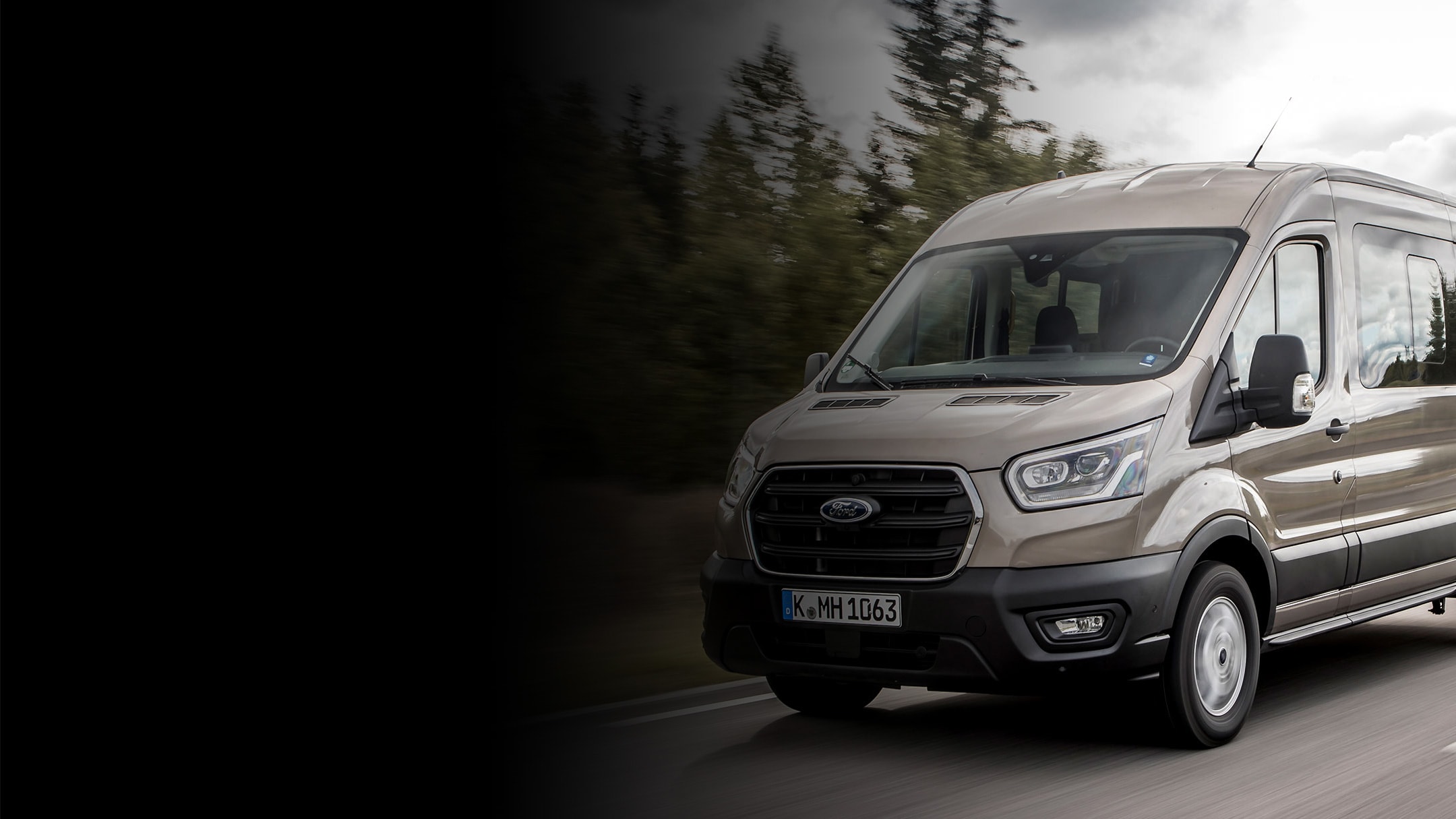 Ford Transit Double Cab driving on rural road